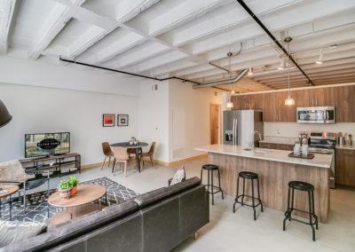 Our Corktown apartments in the Checker building feature 9 ft ceilings, an open floor plan and stainless steel appliances