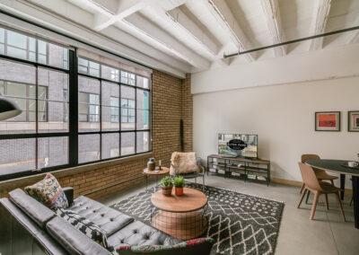 High open ceilings with deconstructed duct work, plus exposed brick are unique to our Corktown loft apartments